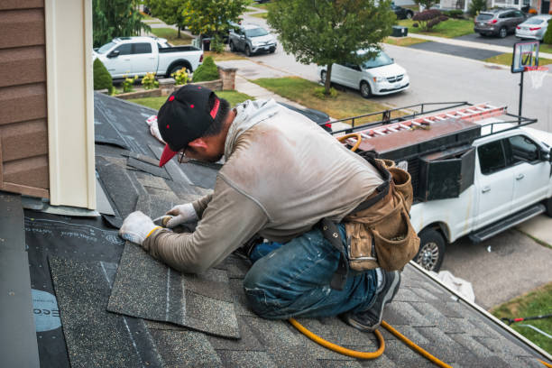 Professional Roofing technician working in Leland, MS